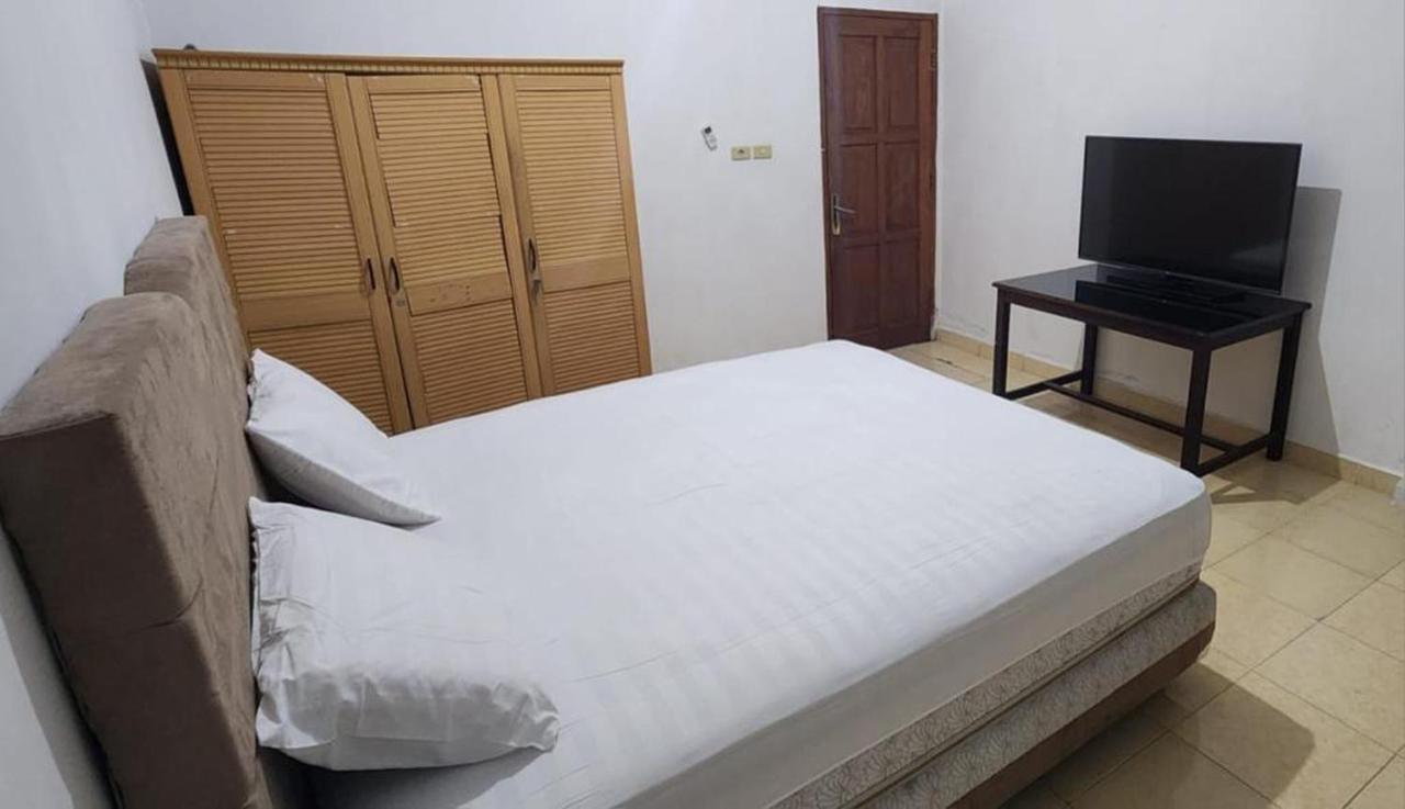 Permata Homestay Kotamobagu Mitra Reddoorz Bagian luar foto