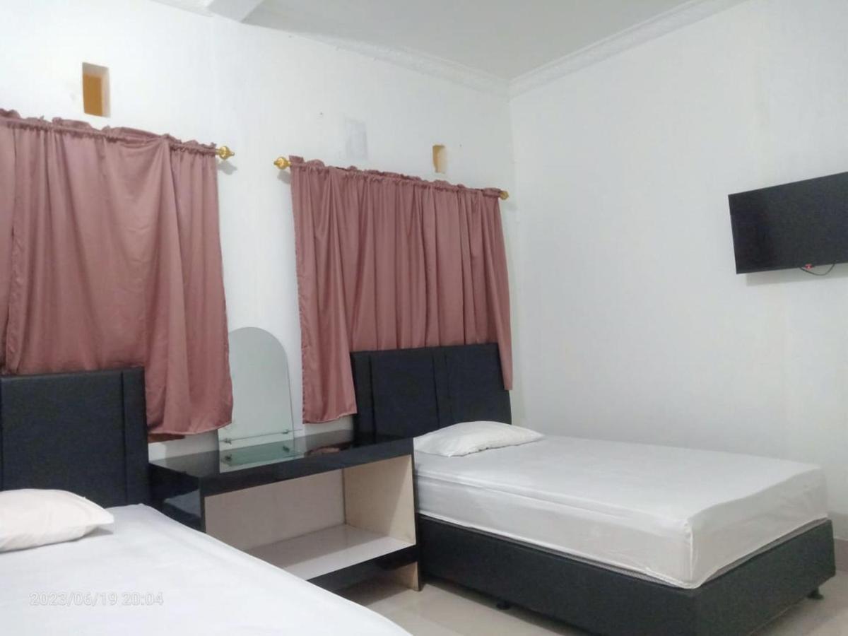 Permata Homestay Kotamobagu Mitra Reddoorz Bagian luar foto