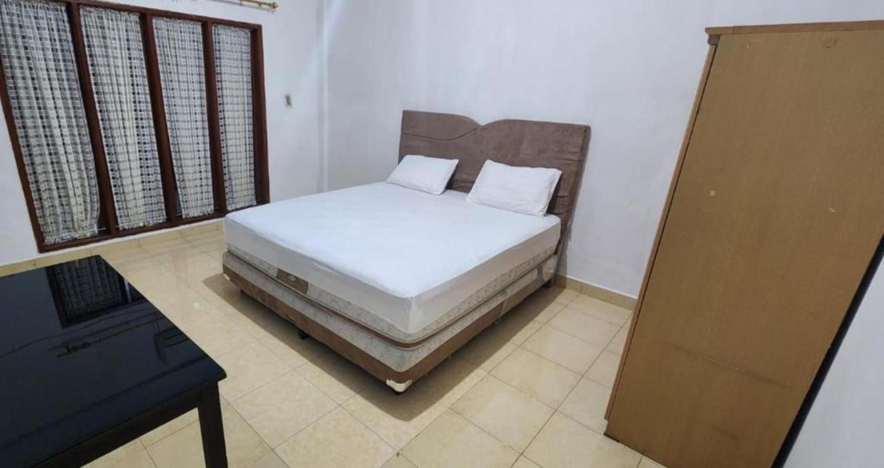 Permata Homestay Kotamobagu Mitra Reddoorz Bagian luar foto