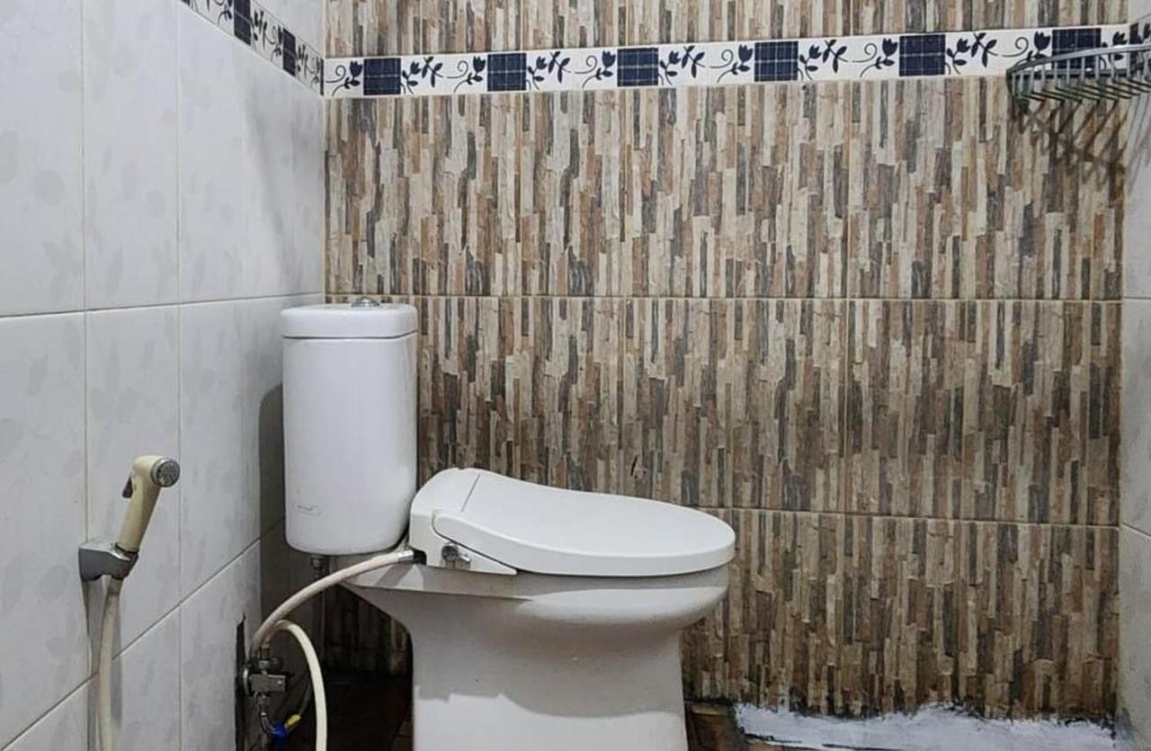 Permata Homestay Kotamobagu Mitra Reddoorz Bagian luar foto